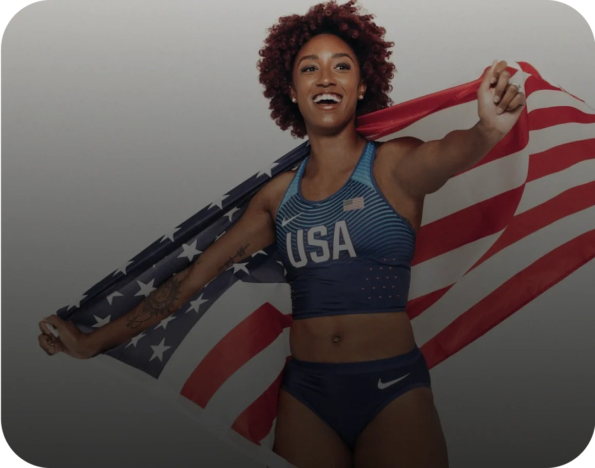 Photo of a woman holding an American flag while wearing a USA athletic outfit, labeled as Brianna McNeal, Olympic Runner.